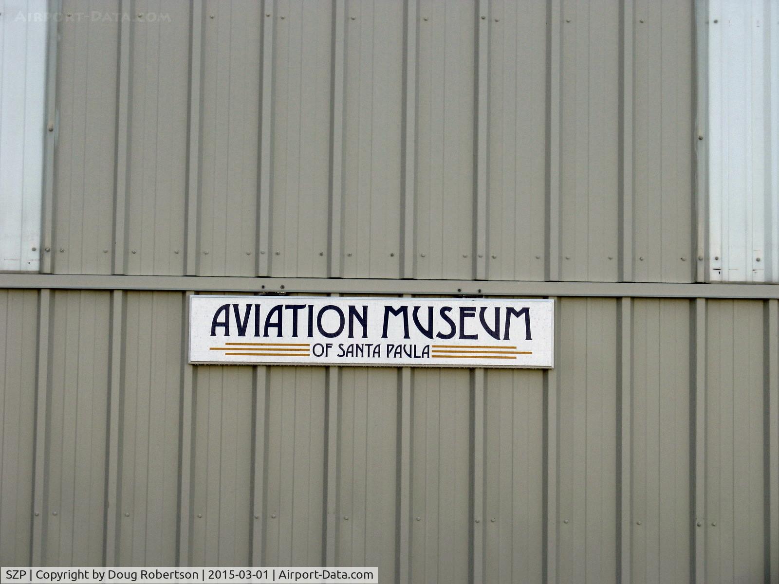 Santa Paula Airport (SZP) - Main Hangar Sign of Aviation Museum of Santa Paula, on closed bi-fold doors.