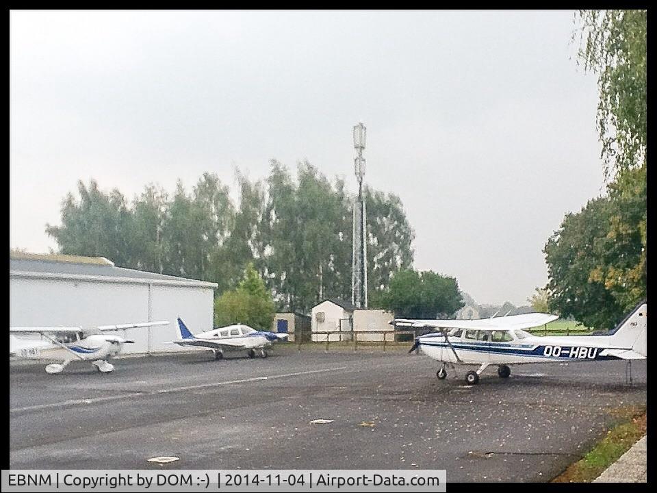 Suarlee Airport, Namur Belgium (EBNM) - EBNM tarmac apron located east of the field close to the maintenance hangar & the briefing office. Up to 6 light aircraft could be acommodated with tie-downs available if needed! 