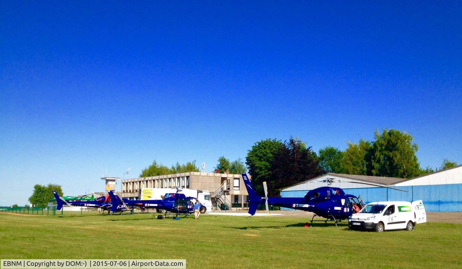 Suarlee Airport, Namur Belgium (EBNM) - Plenty of helicopters parking spots. In the background, the hotel-restaurant 