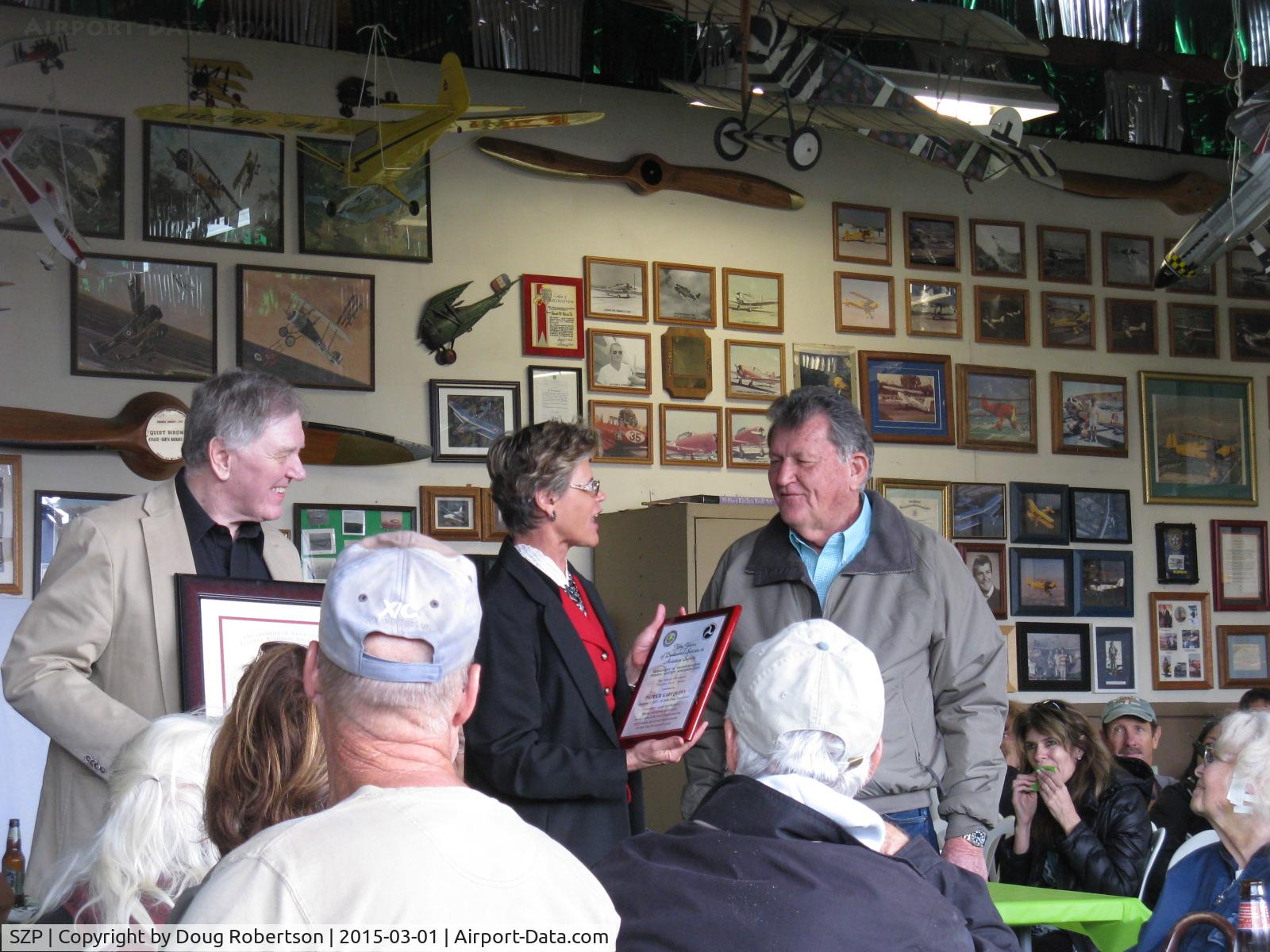 Santa Paula Airport (SZP) - Pat Quinn Bucker Museum celebration party on the occasion of his receiving the FAA Master Pilot Award for 50 years accident free flying-no violations award, proud Host Pat with conferring officials.