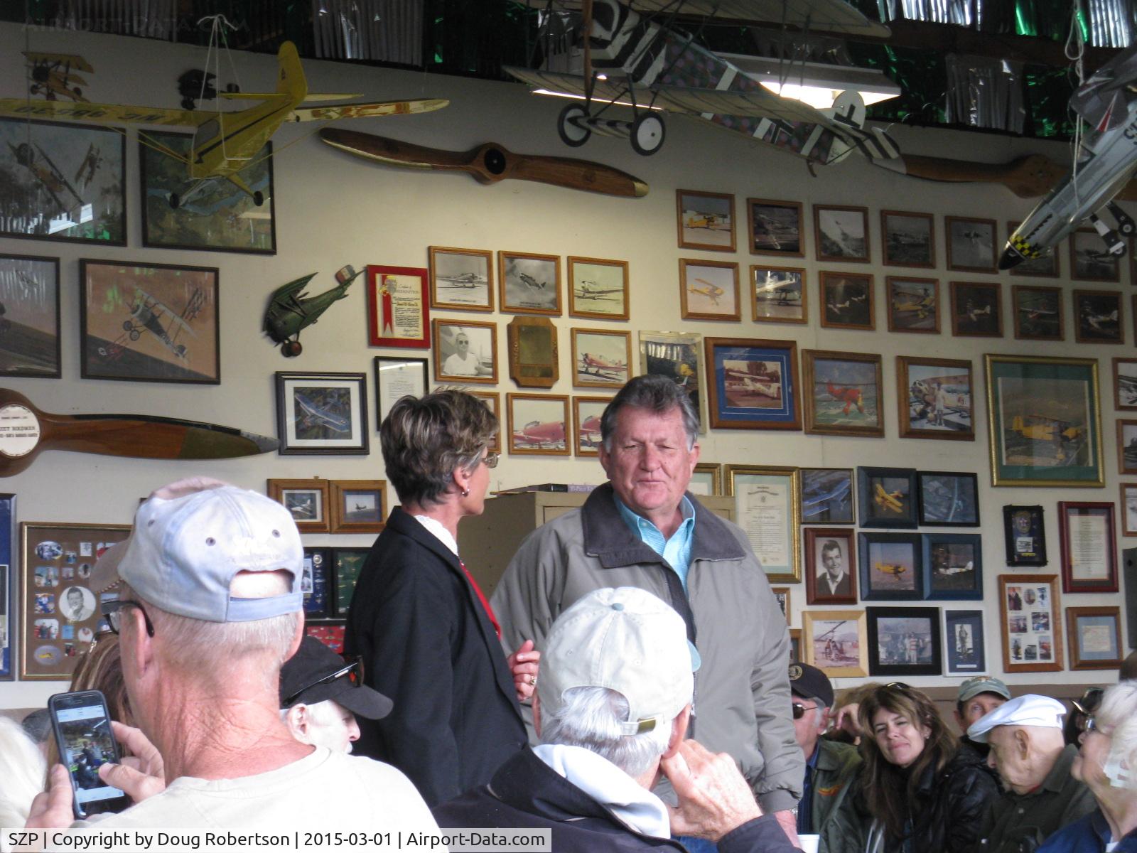 Santa Paula Airport (SZP) - Pat Quinn Bucker Museum hangar on the occasion of Pat receiving the FAA Wright Brothers Master Pilot Award for 50 years accident free-no violations flying. Proud Pat receiving accolades from the conferring official.
