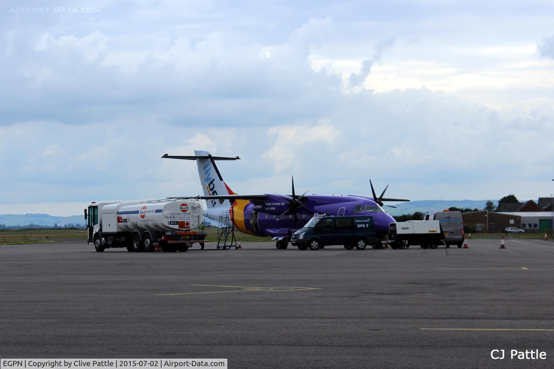 Dundee Airport, Dundee, Scotland United Kingdom (EGPN) - A Dornier of Flybe receiving fuel, food and luggage at Dundee Riverside Airport EGPN