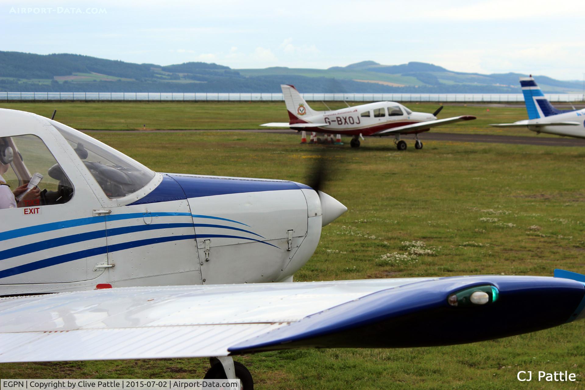 Dundee Airport, Dundee, Scotland United Kingdom (EGPN) - A view of the Tayside Aviation parking area at Dundee Riverside EGPN