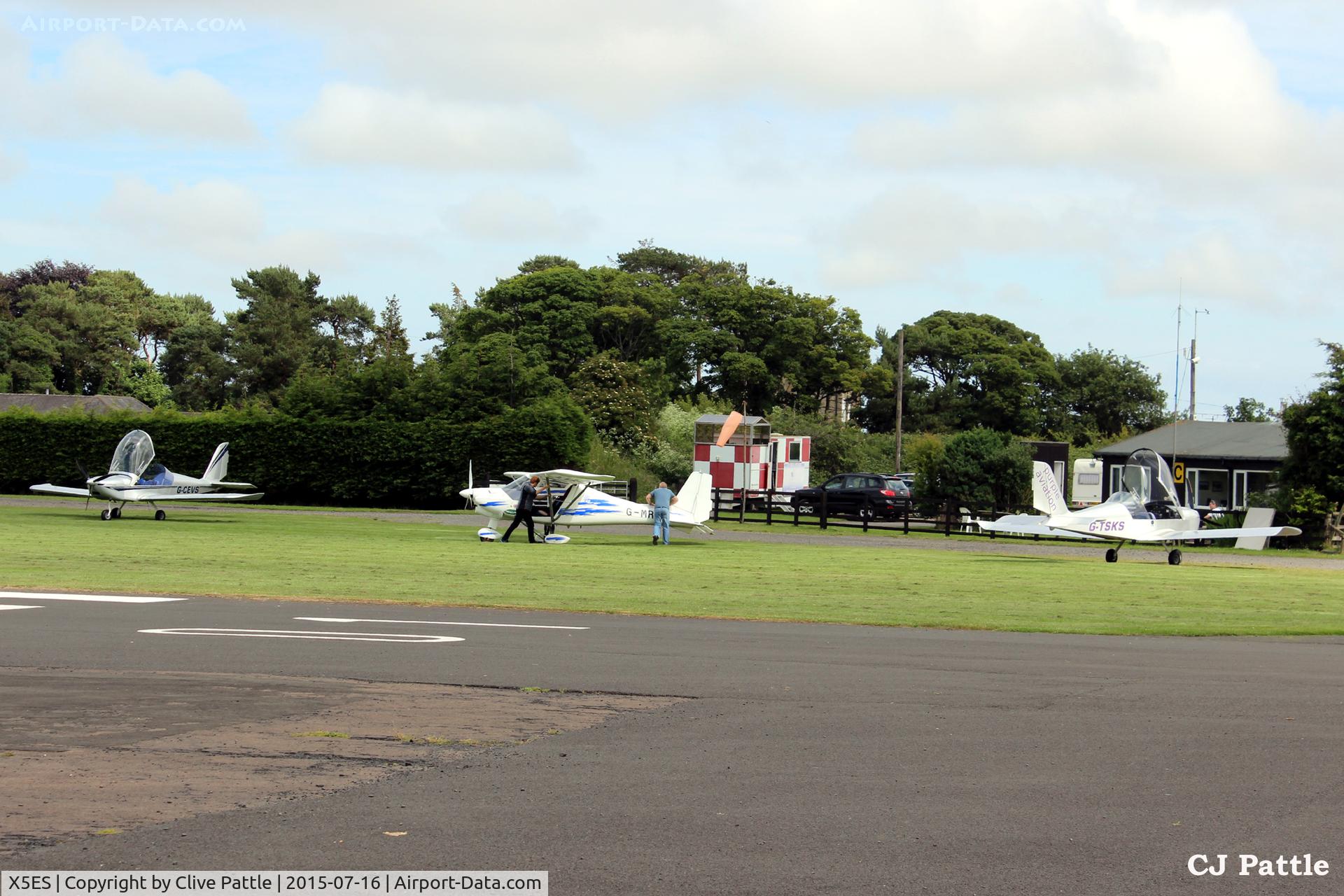 X5ES Airport - Long distance view of the Clubhouse at Eshott X5ES