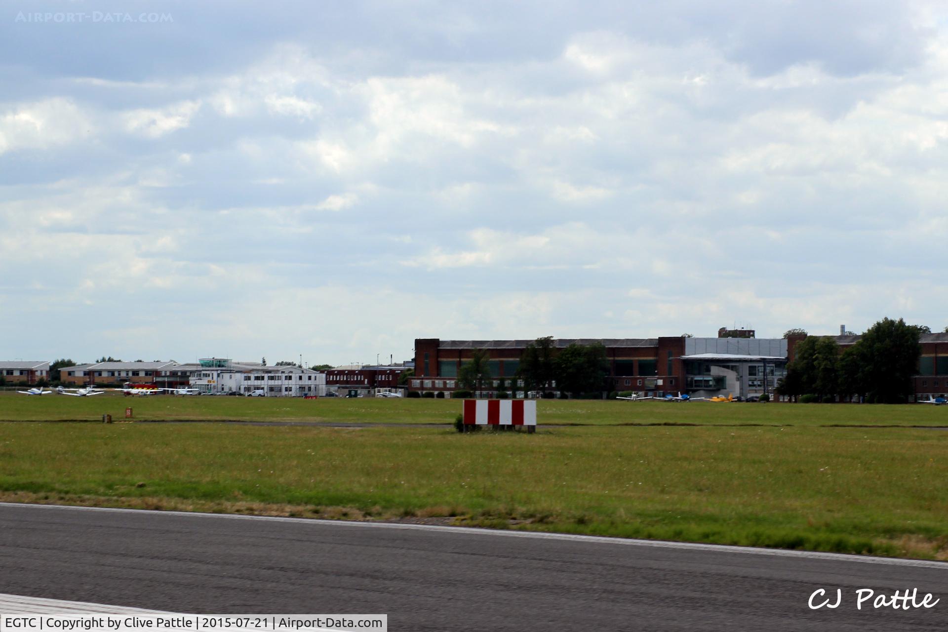 Cranfield Airport, Cranfield, England United Kingdom (EGTC) - Airport buildings at Cranfield EGTC, Bedfordshire, UK viewed from the runway