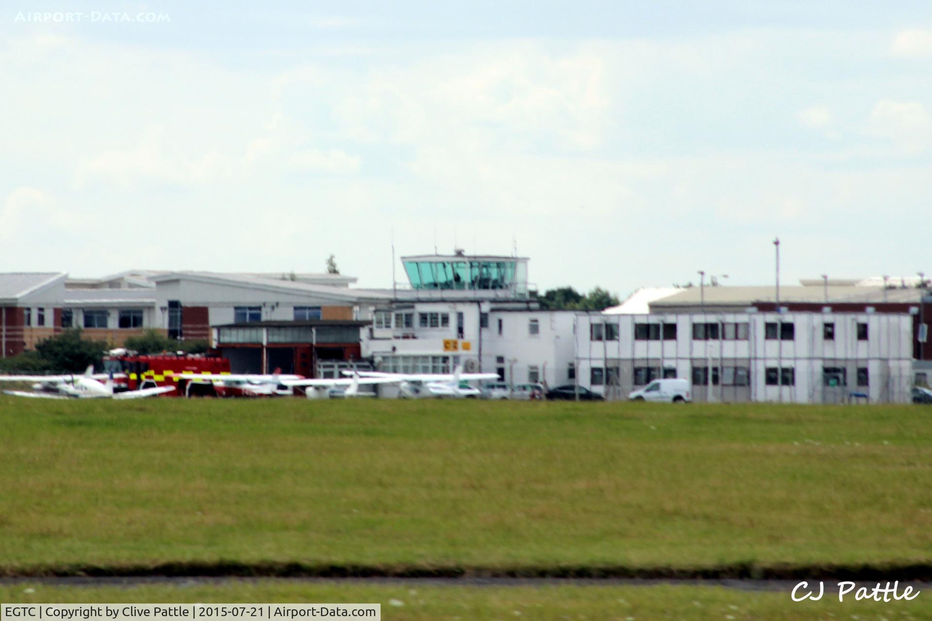 Cranfield Airport, Cranfield, England United Kingdom (EGTC) - The tower and other airport buildings at Cranfield EGTC, Bedfordshire, UK viewed from the runway