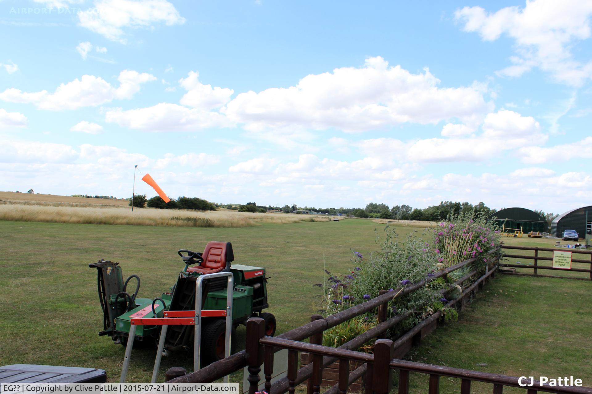EG?? Airport - A view of the clubhouse and airfield at the Sandy Microlight Airfield at Sandy, Bedfordshire, UK