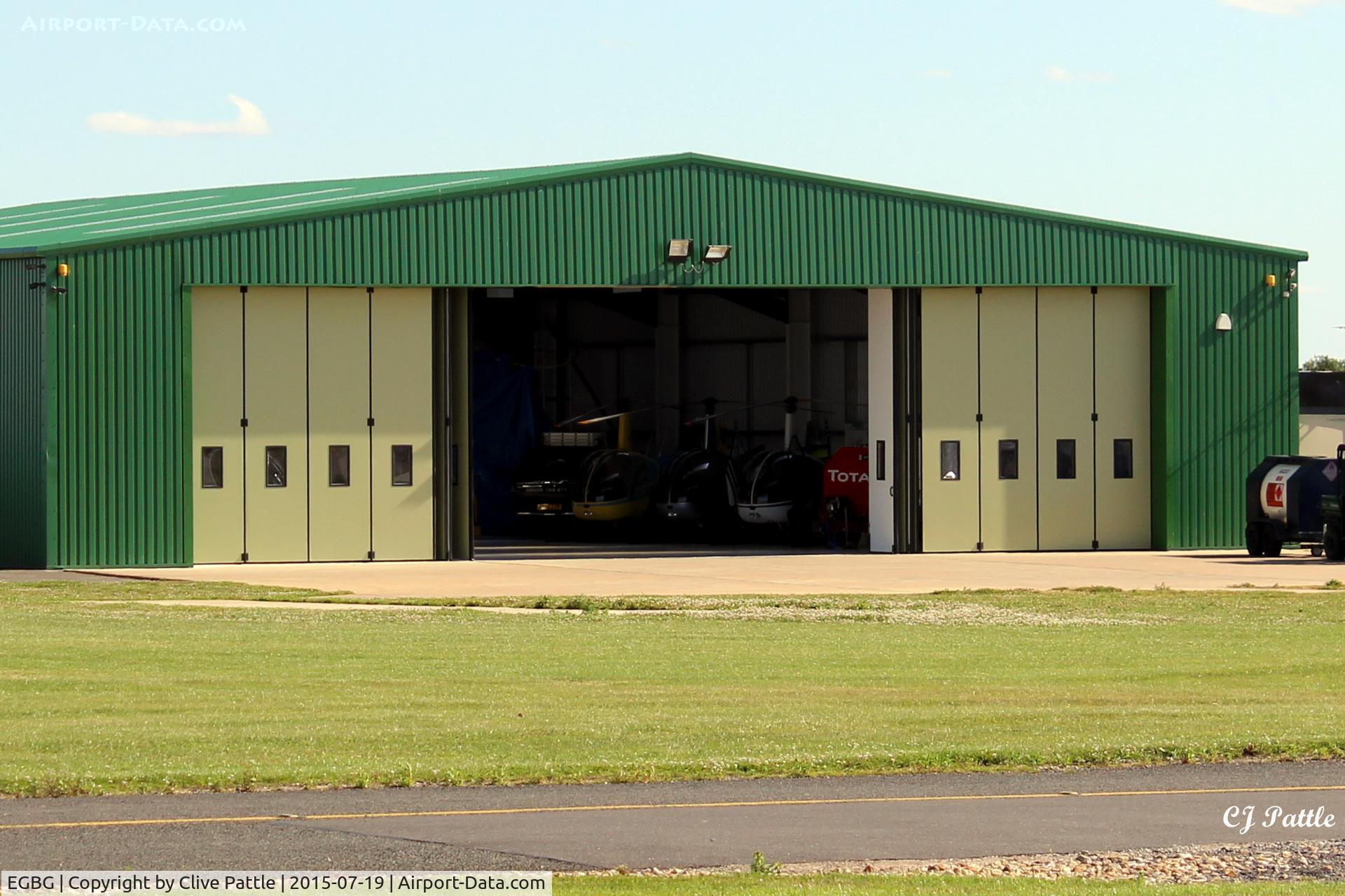 Leicester Airport, Leicester, England United Kingdom (EGBG) - A hangar at Leicester EGBG containing helicopters