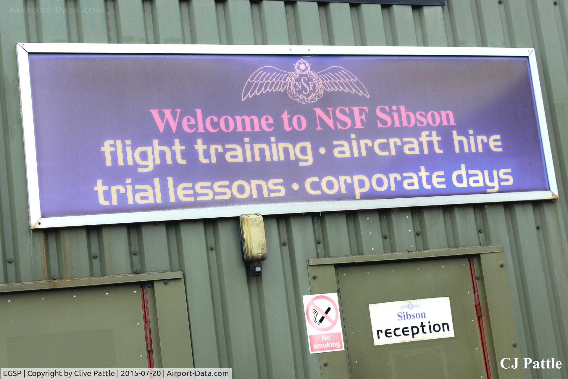 Peterborough/Sibson Airport, Peterborough, England United Kingdom (EGSP) - Some hangar signage at Sibson EGSP