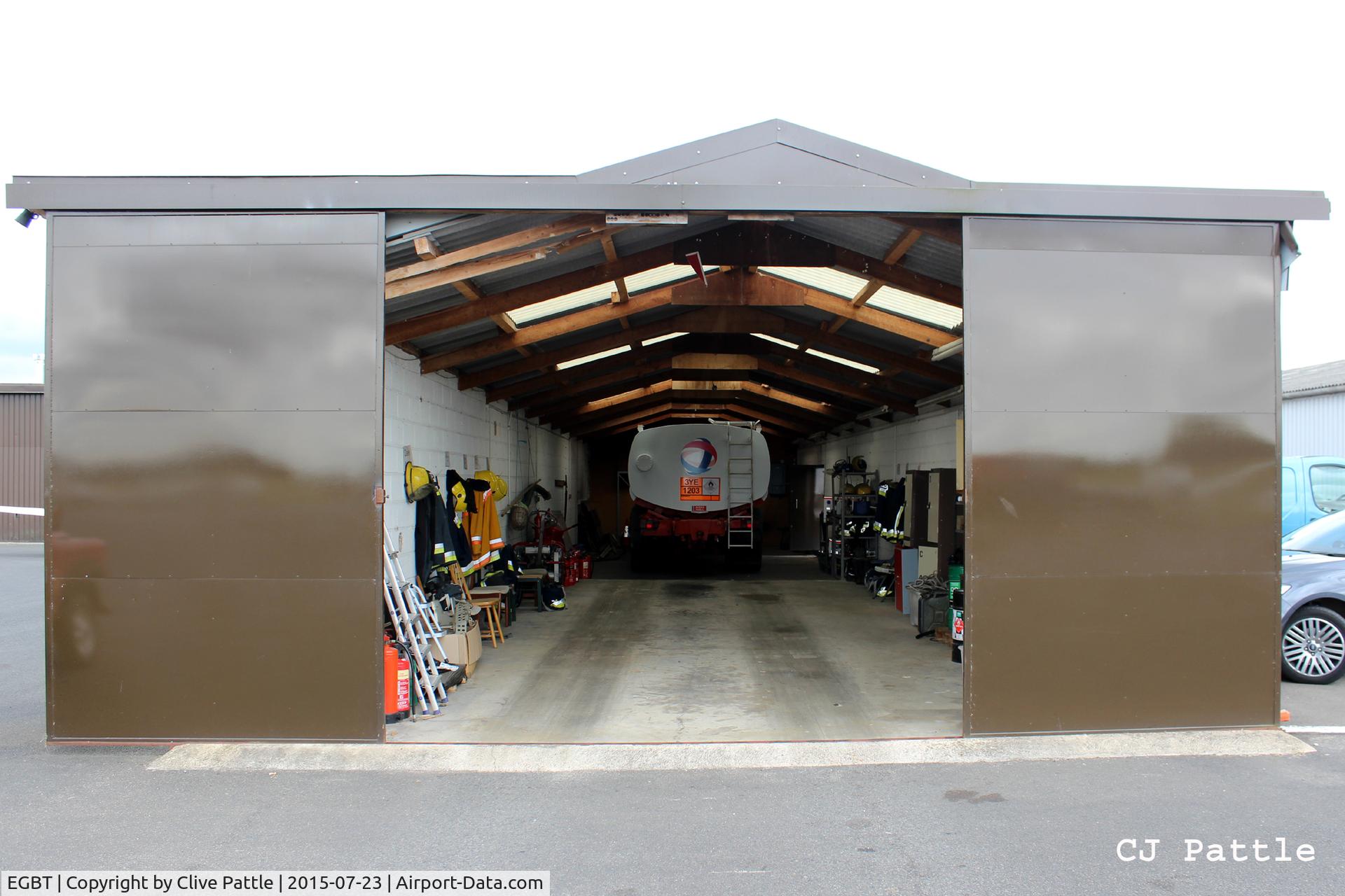 Turweston Aerodrome Airport, Turweston, England United Kingdom (EGBT) - The Fire Station at Turweston EGBT, with firefighting equipment ready for use.