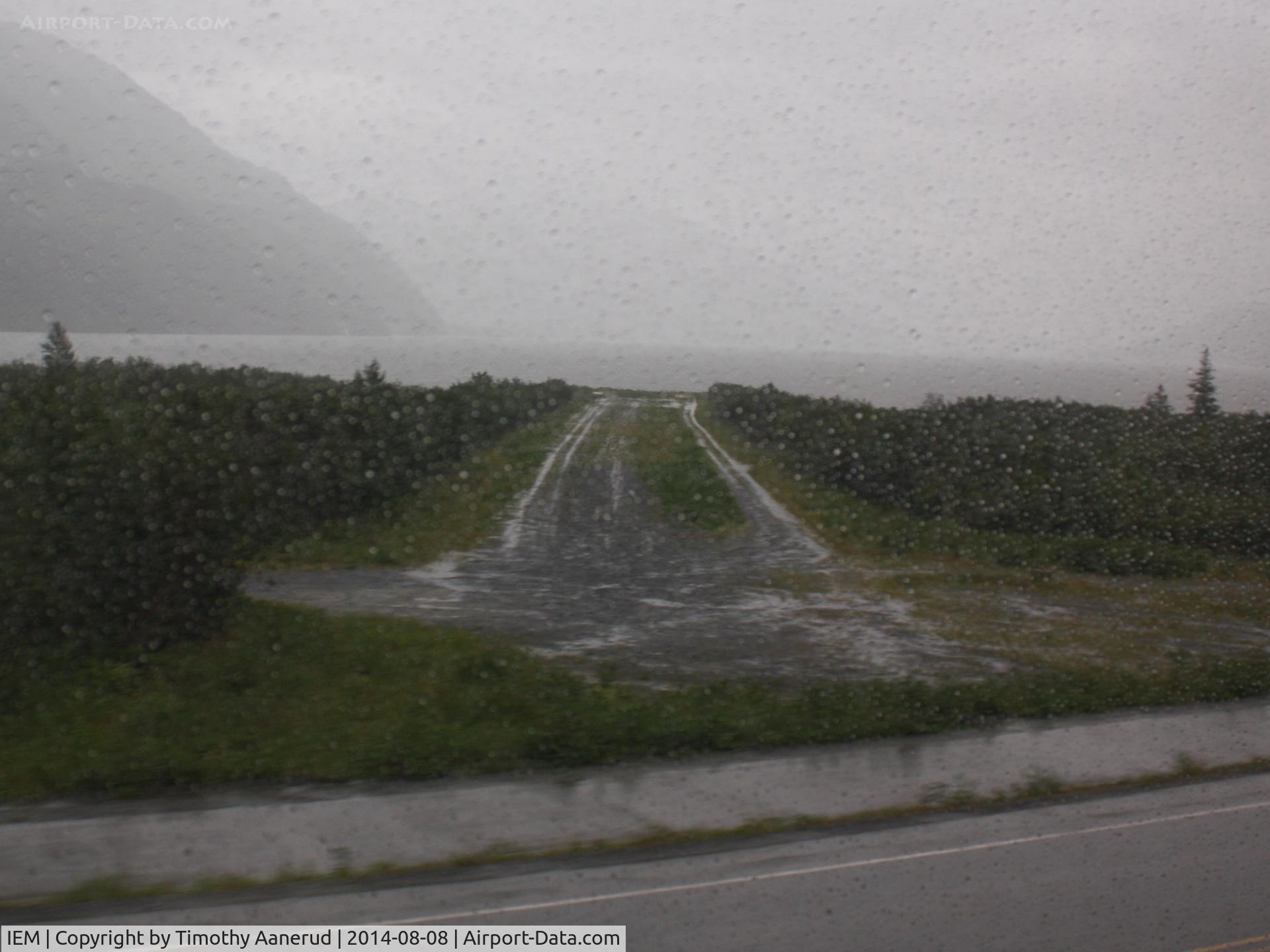Whittier Airport (IEM) - Whittier airport as seen during pouring rain while riding the Alaskan Railroad