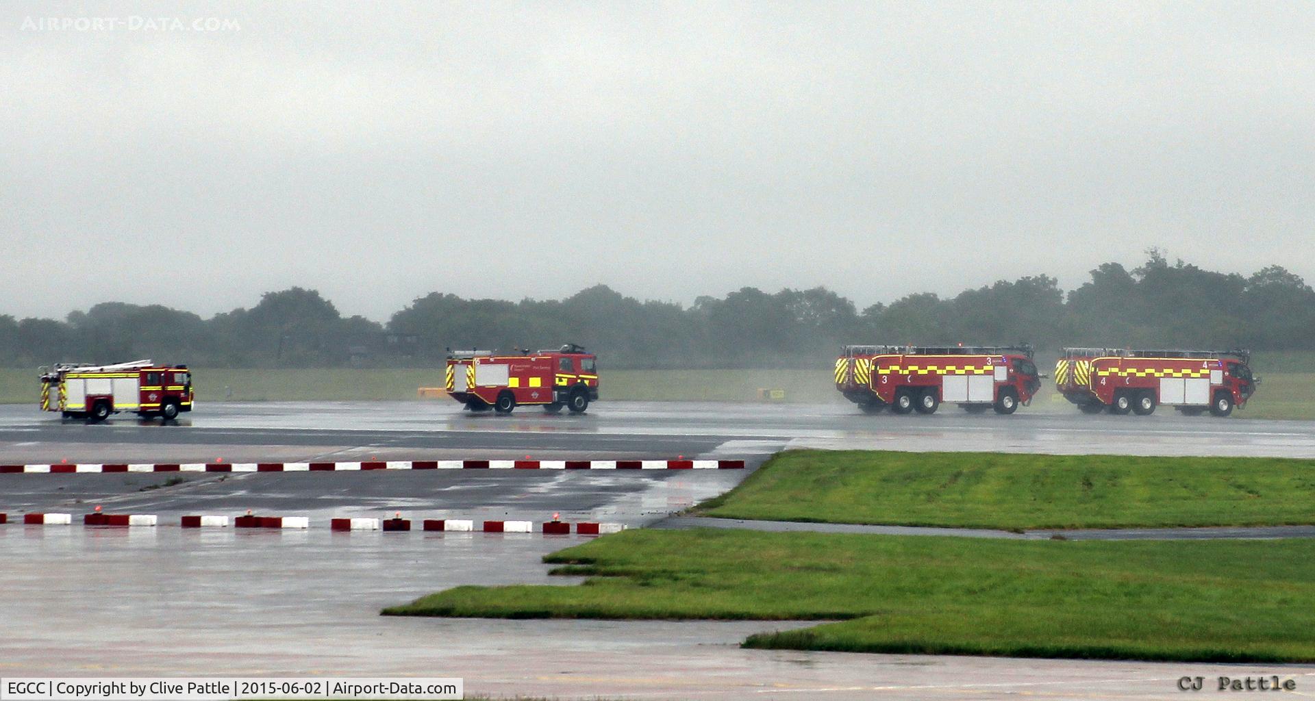 Manchester Airport, Manchester, England United Kingdom (EGCC) - Fire vehicles convoy at Manchester EGCC