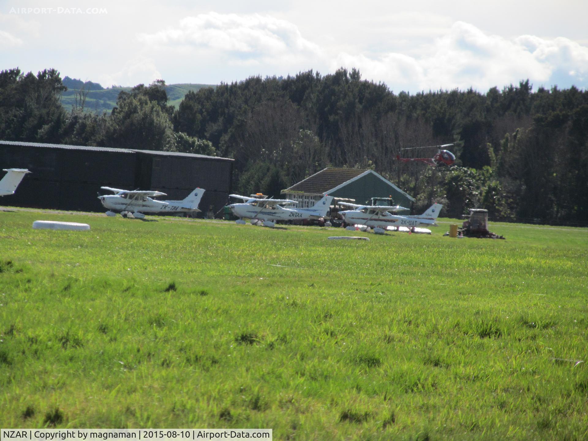 Ardmore Airport, Auckland New Zealand (NZAR) - a few flying club Cessna parked by tower due to a filming session on their normal apron