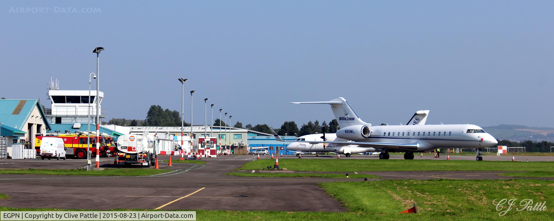 Dundee Airport, Dundee, Scotland United Kingdom (EGPN) - Panoramic shot of Dundee Riverside airport EGPN taken on a (fairly) rare sunny day, with a visiting bizjet (N65WL) and a Flybe Dornier (G-BYMK) on the apron.