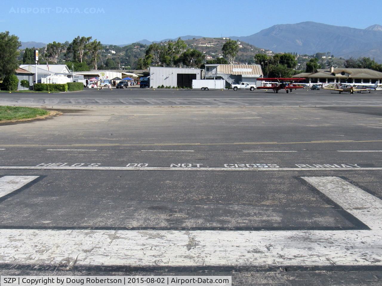Santa Paula Airport (SZP) - READ AND HEED! Helipad Warning-Do Not Cross Runway To Refuel, Call for Shell 100LL truck refueler. Phone number is at helipad. Call 805-415-0223
