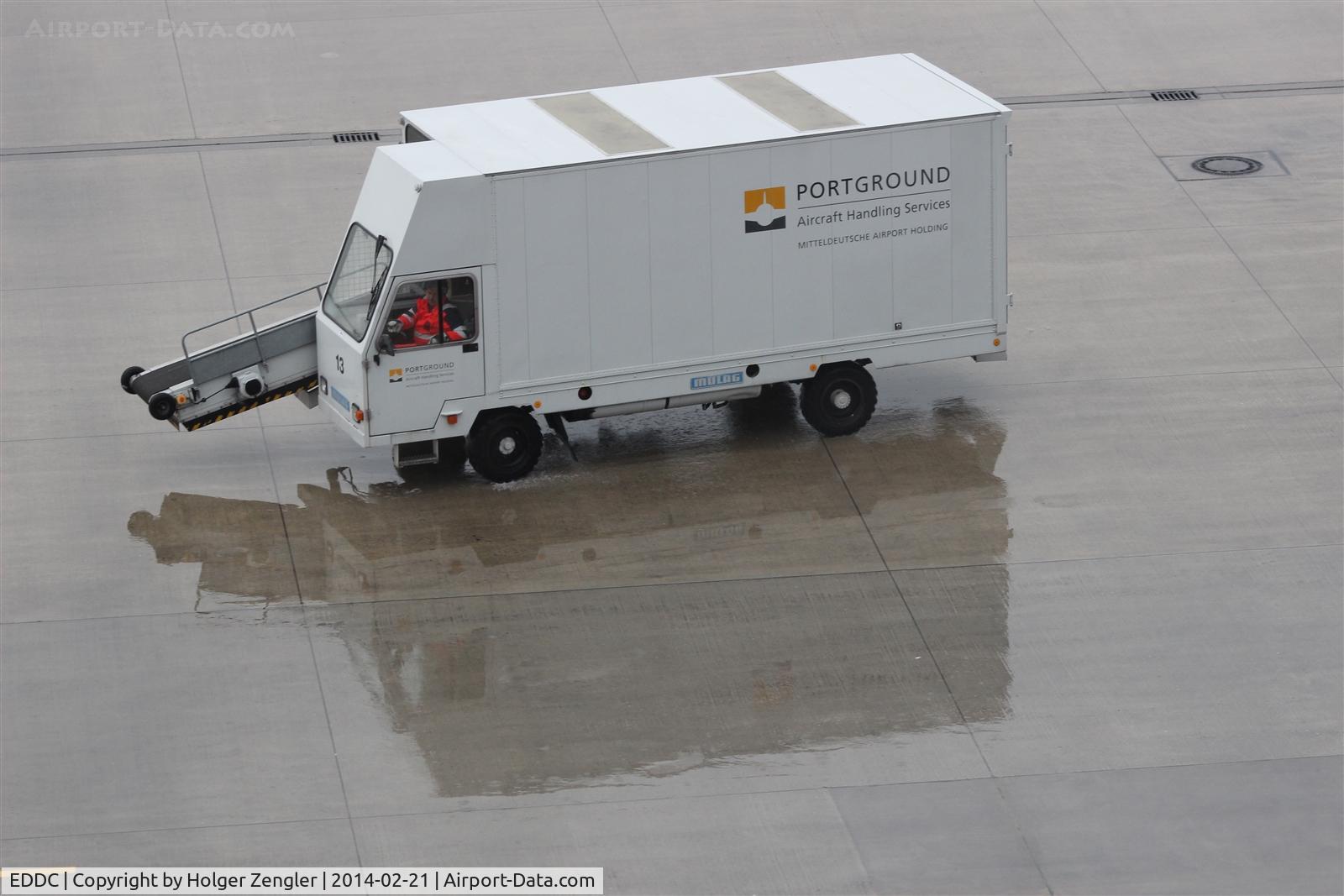 Dresden Klotzsche Airport, Dresden Germany (EDDC) - Saxonian suitcase carrier still in wet environment......