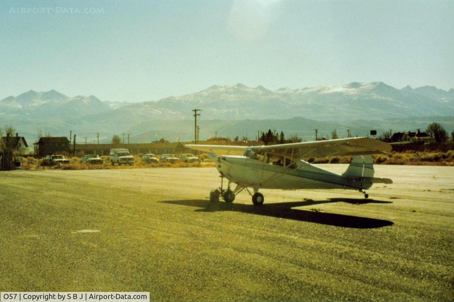 Bryant Field Airport (O57) - 78E at Bridgeport,Ca with the Walker River Lodge seen in the distance.Nice place to stay and its neat to look out and see your plane. Notice the six vehicles that pilots leave so they will have transportation when they fly in.Nice!