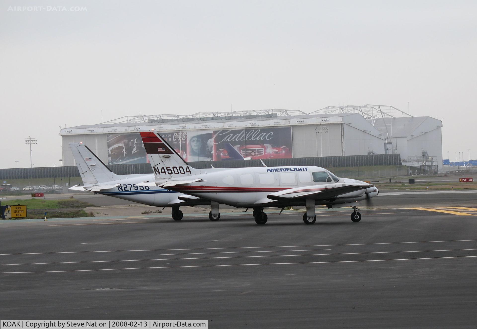 Metropolitan Oakland International Airport (OAK) - Ameriflight PA-31 Navajos N45004 and N27996 getting ready for the daily 