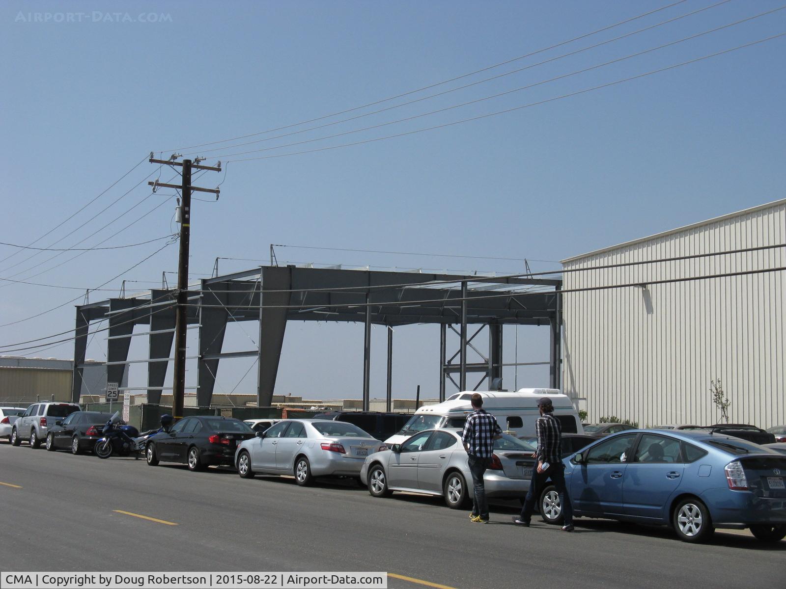 Camarillo Airport (CMA) - New EAA Chapter 723 large hangar under construction adjacent present CAF hangars extends from street to taxiway. On site former EAA Chapter 723 much smaller hangars. Street view.