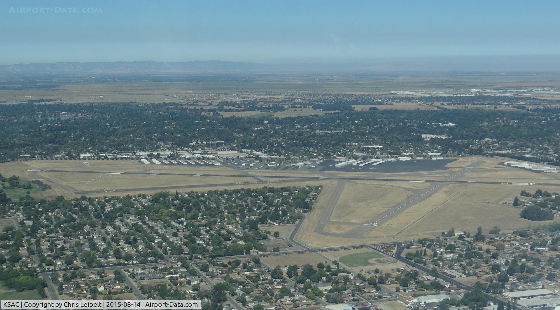 Sacramento Executive Airport (SAC) - On downwind leg in N555TK, with a great view of Sacramento Executive Airport to our left.