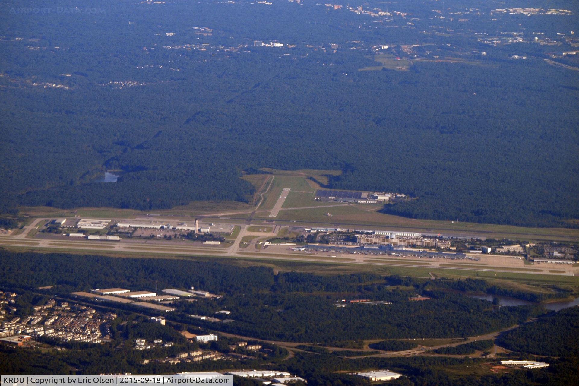 Raleigh-durham International Airport (RDU) - RDU as seen from the air after take off and heading west.