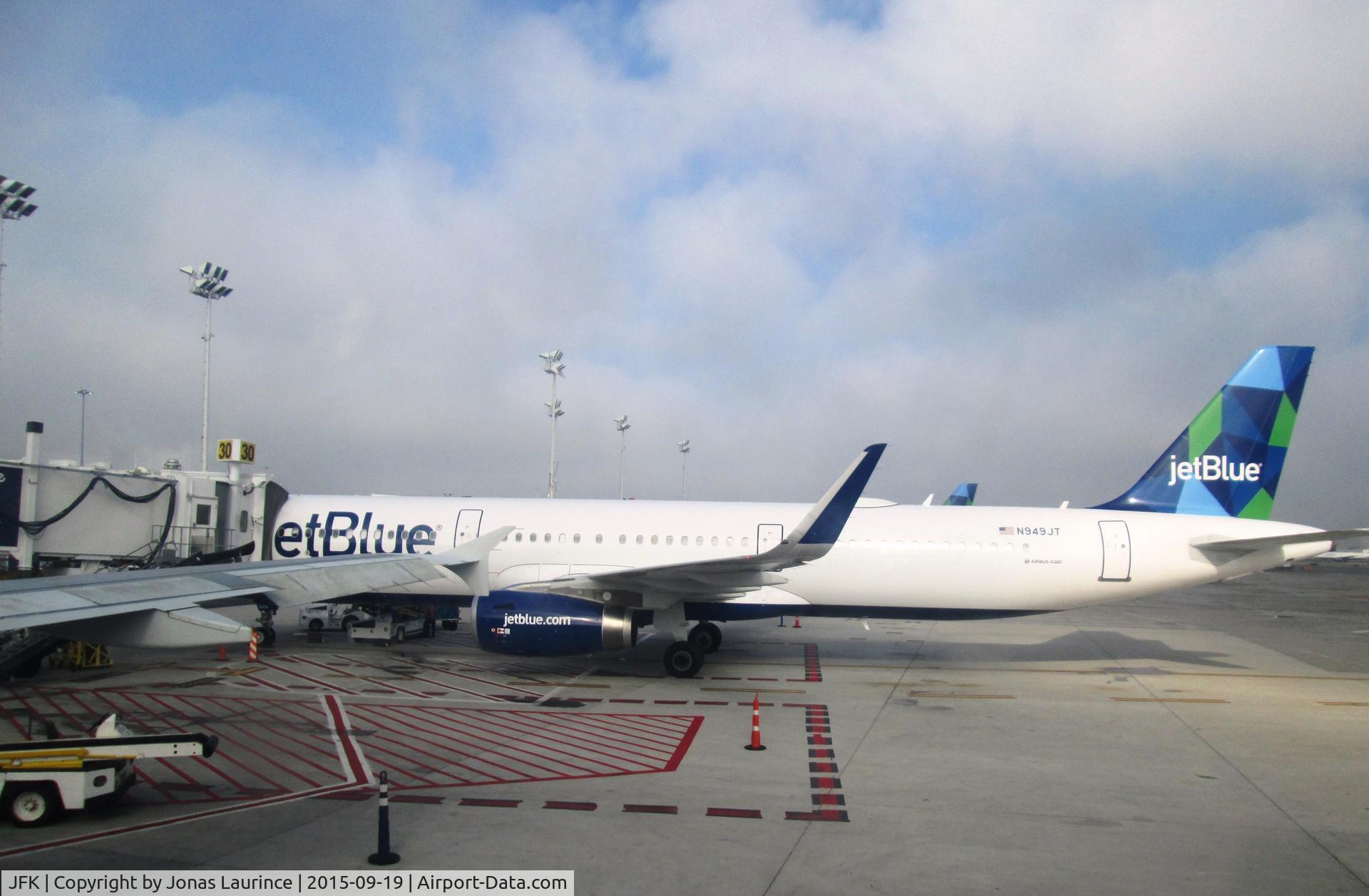 John F Kennedy International Airport (JFK) - JetBlue Aircrafts boarding at JFK International Airport of New York