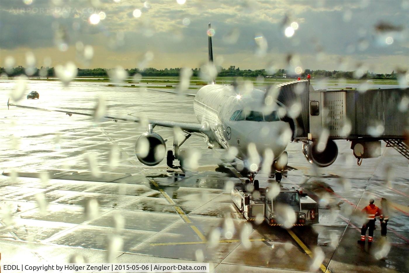 Düsseldorf International Airport, Düsseldorf Germany (EDDL) - View on apron after the rain has gone...
