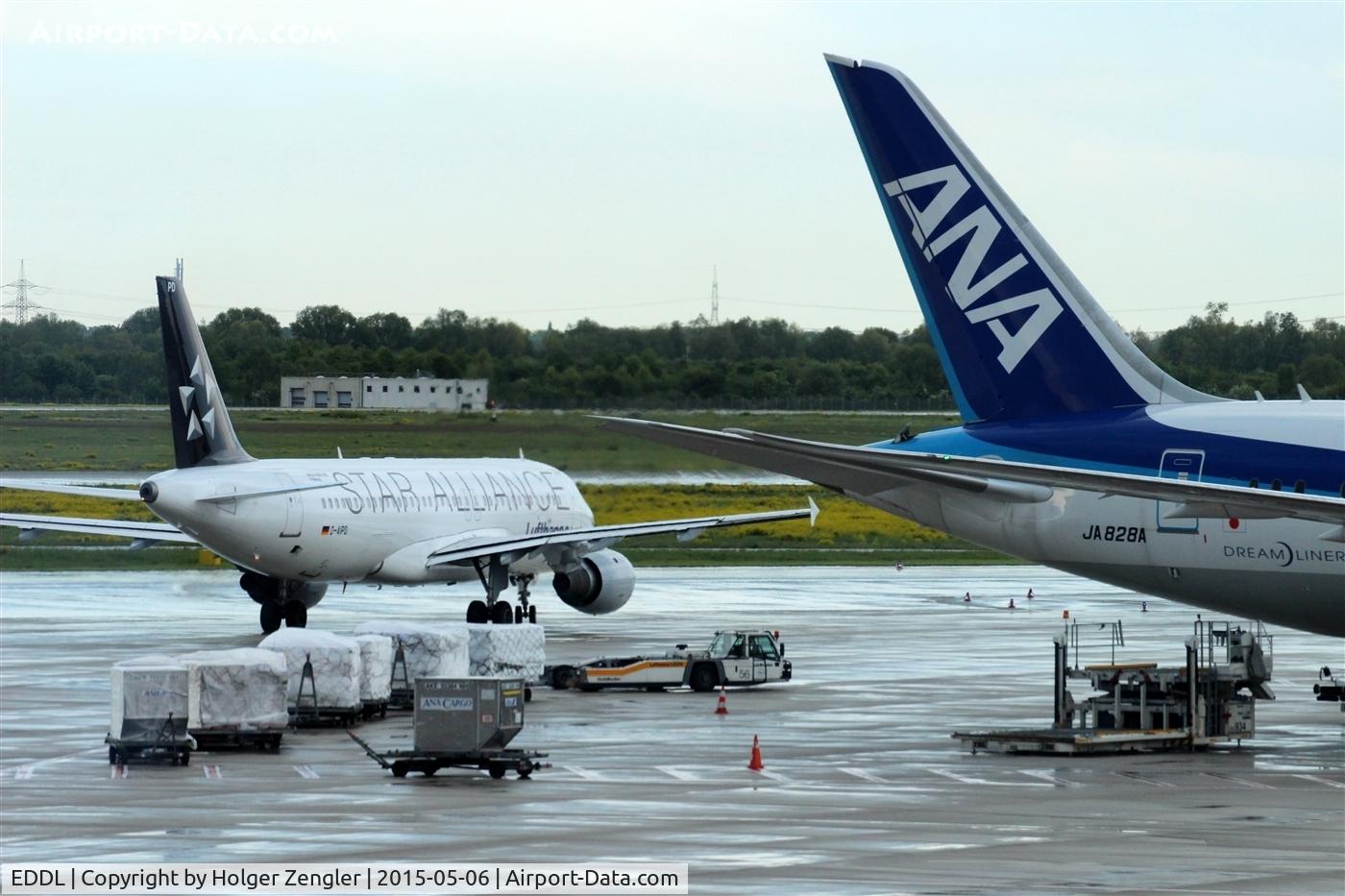 Düsseldorf International Airport, Düsseldorf Germany (EDDL) - Still life on a wet apron....