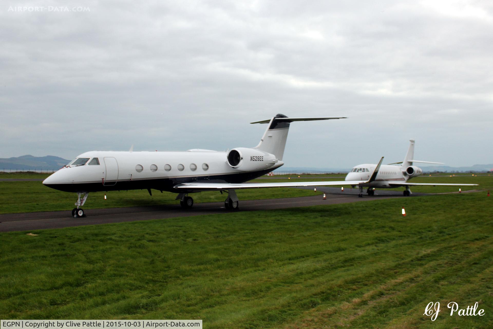 Dundee Airport, Dundee, Scotland United Kingdom (EGPN) - A bizjet busy weekend at Dundee Riverside EGPN during the Dunhill Golf Championships at nearby St Andrews. Even the north taxiway was used for aircraft parking the 13 visitors.
