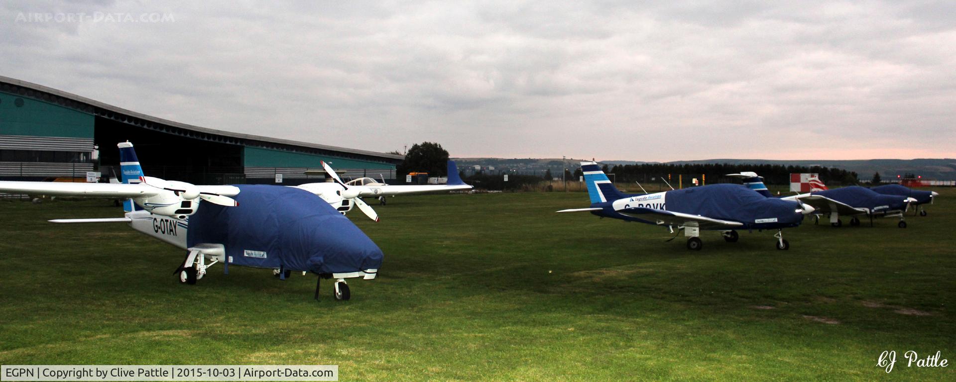 Dundee Airport, Dundee, Scotland United Kingdom (EGPN) - A dusk shot, in fading light,  of a Tayside Aviation line-up at Dundee Riverside EGPN