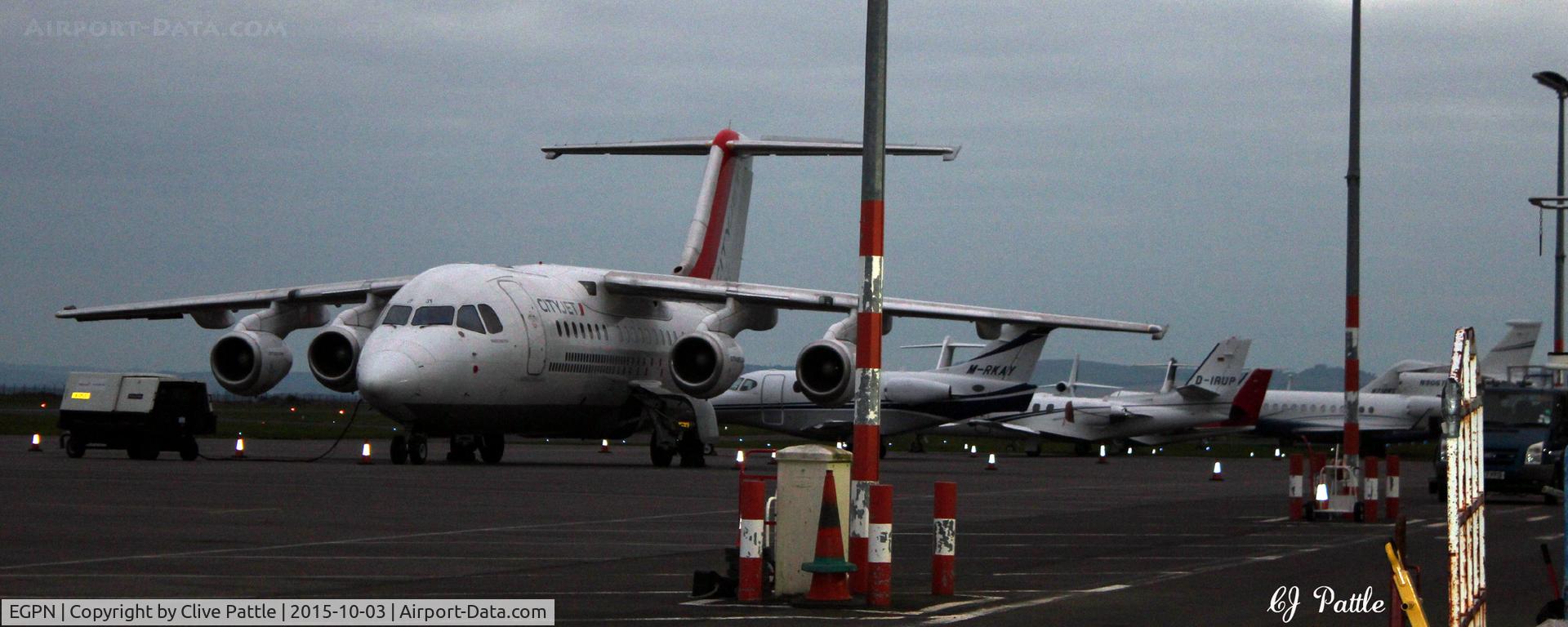 Dundee Airport, Dundee, Scotland United Kingdom (EGPN) - A bizjet busy weekend at Dundee Riverside EGPN - the main apron during the Dunhill Golf Championships at nearby St Andrews. Chartered BAe 146  is Cityjet EI-RJY