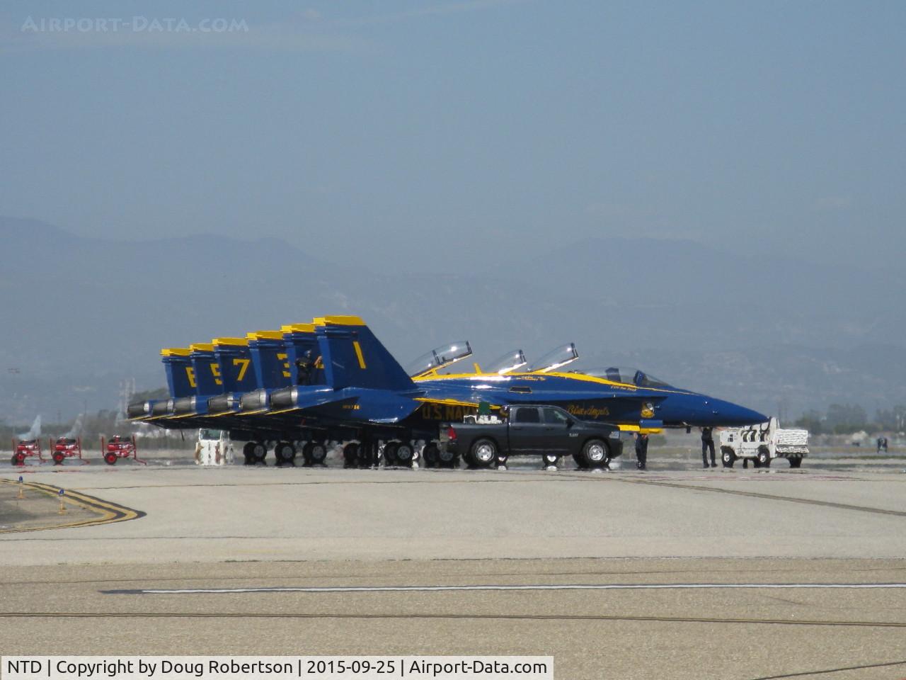 Point Mugu Nas (naval Base Ventura Co) Airport (NTD) - Five Blue Angels F/A-18C single seat and one F/A-18D dual seat (tail #7) on display on practice day before the weekend air show. two General Electric F404-GE-402 turbofans. Max speed Mach 1.8