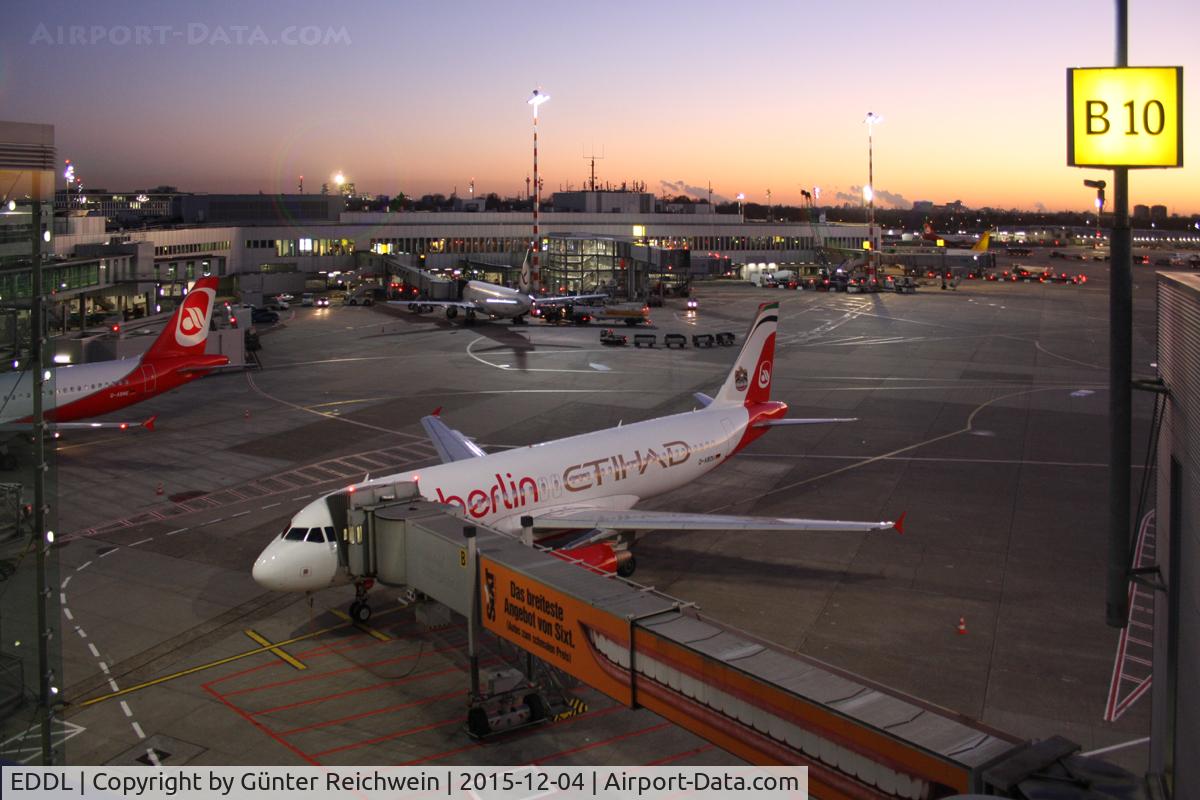Düsseldorf International Airport, Düsseldorf Germany (EDDL) - Apron at Terminal B/C late afternoon