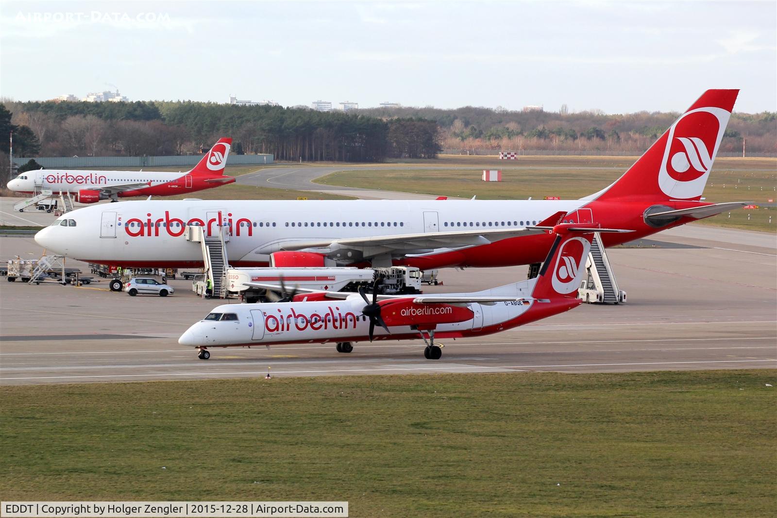 Tegel International Airport (closing in 2011), Berlin Germany (EDDT) - Please notice: Even a red and white ESSO road tanker is authorized to load red and white AirBerliners with fuel.....;-)