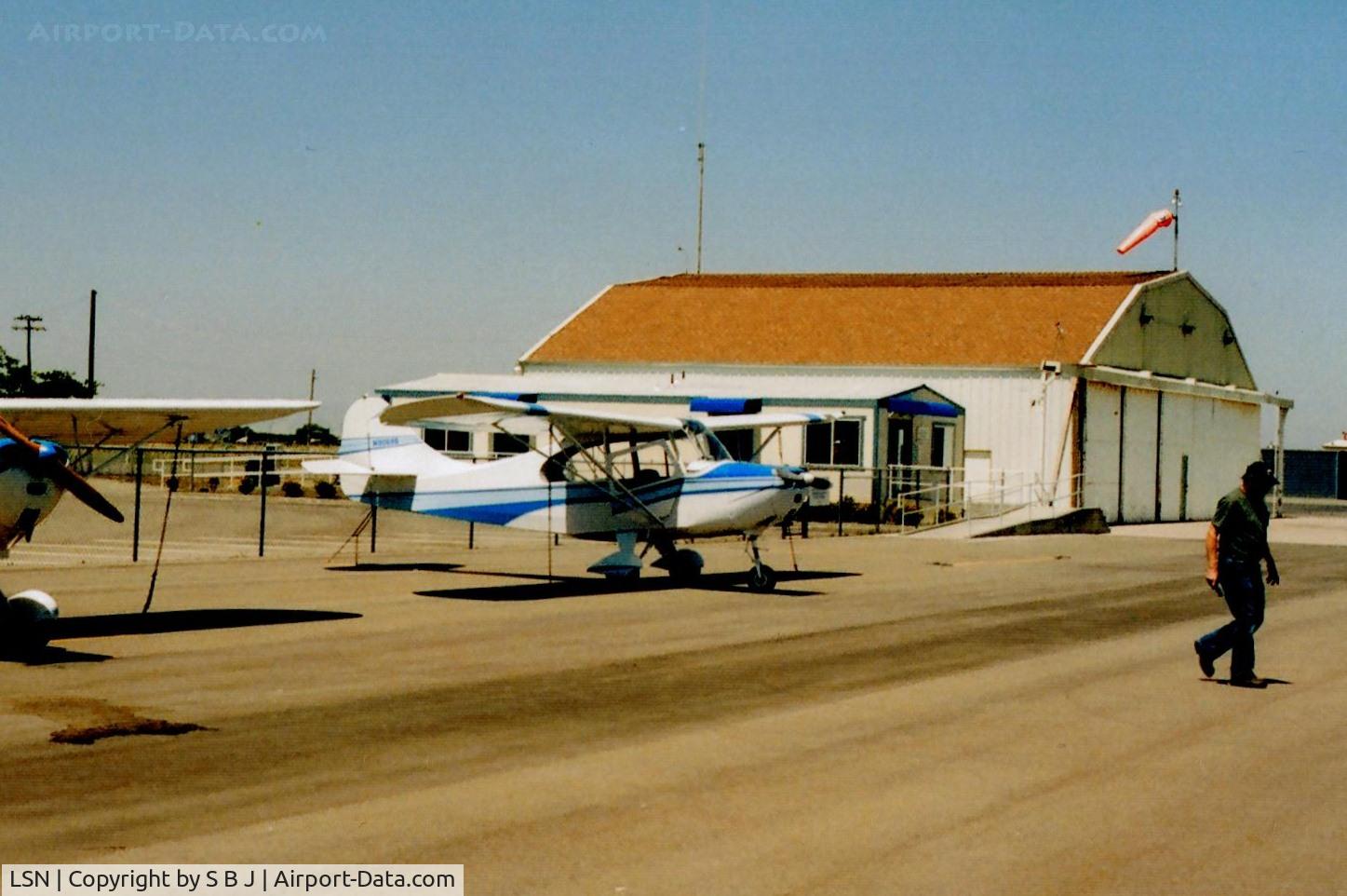 Los Banos Municipal Airport (LSN) - Good picture of the airport office and large hangar next to it.