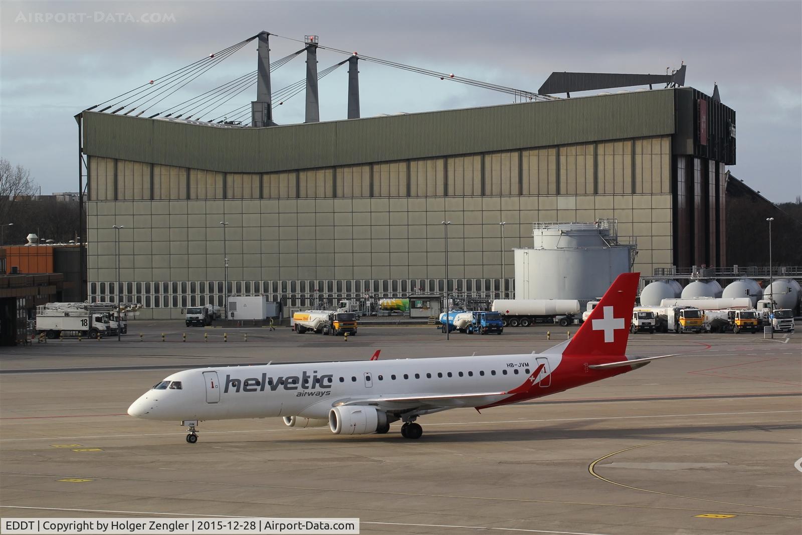 Tegel International Airport (closing in 2011), Berlin Germany (EDDT) - Swiss aircraft in front of AirBerlin hangar and fueltrucks between both ....