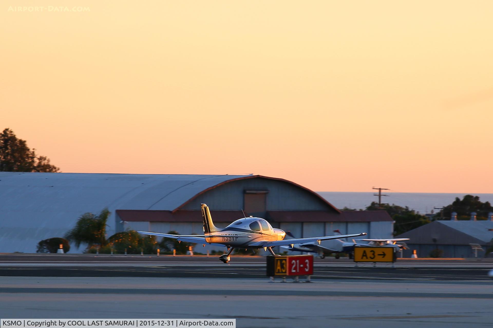 Santa Monica Municipal Airport (SMO) - A Cirrus departing from KSMO Rwy21 at sunset