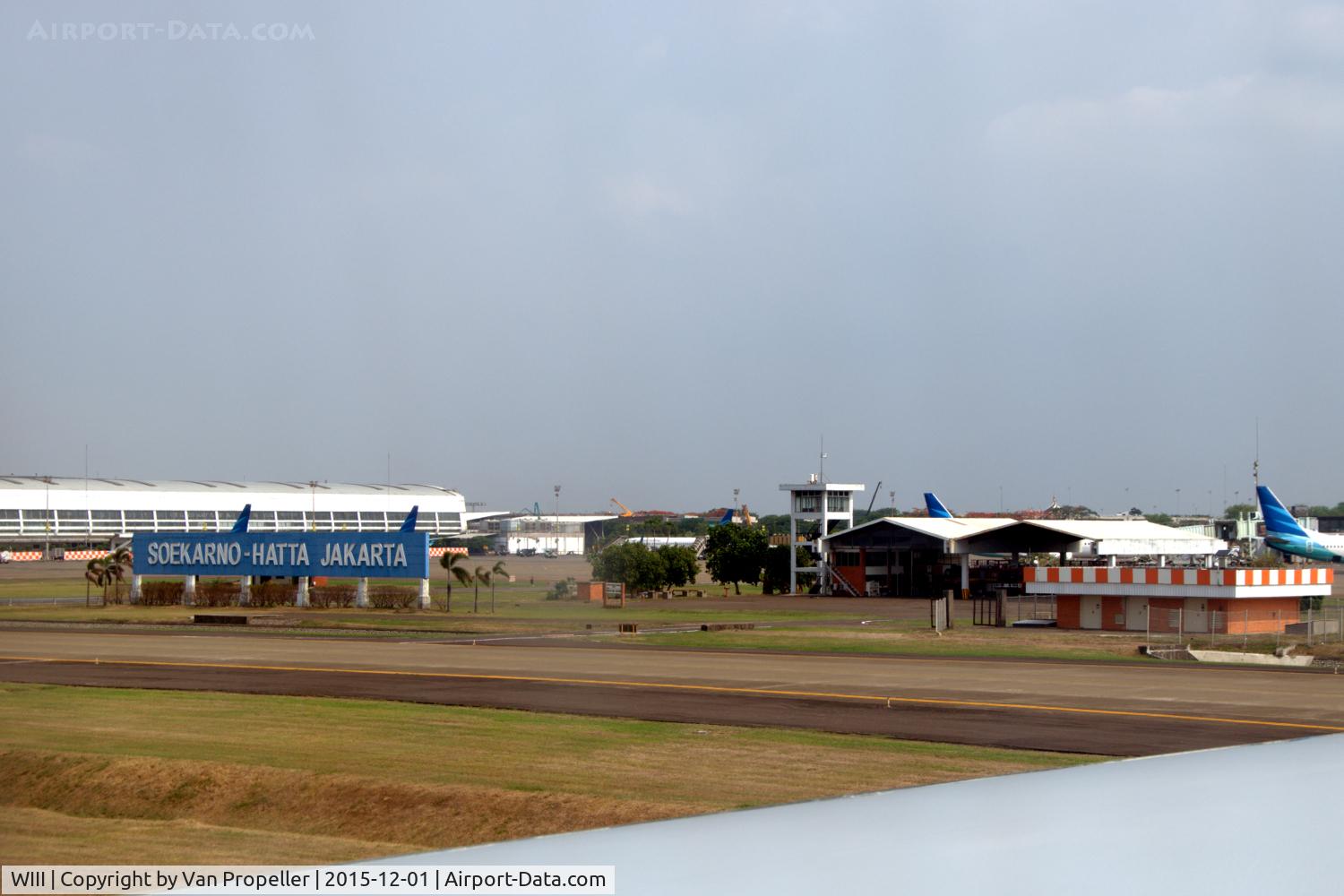 Soekarno-Hatta International Airport, Cengkareng, Banten (near Jakarta) Indonesia (WIII) - The big blue sign leaves no doubt about which airport this is.