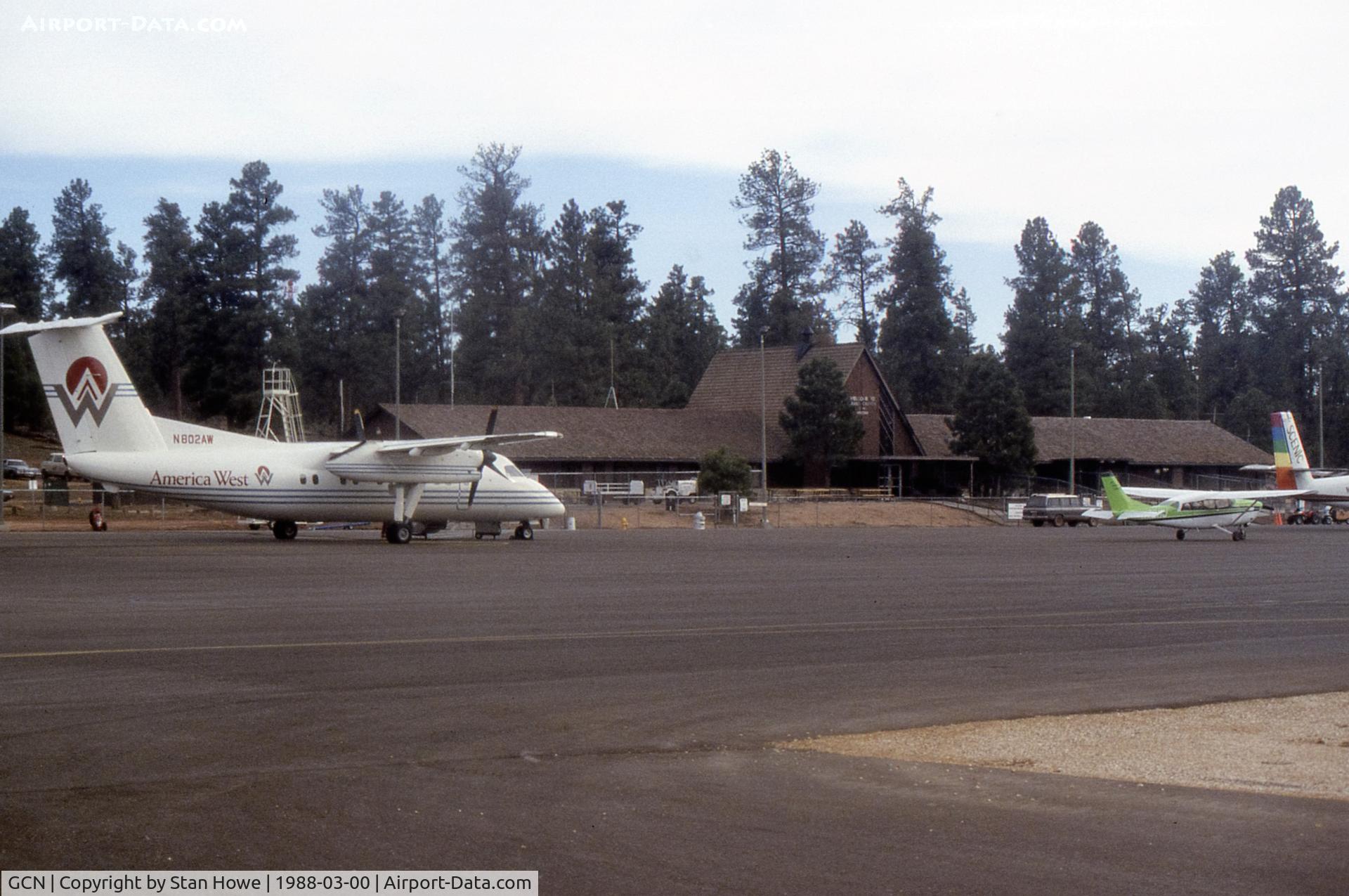Grand Canyon National Park Airport (GCN) - Airside of terminal in 1988. America West N802AW on apron.