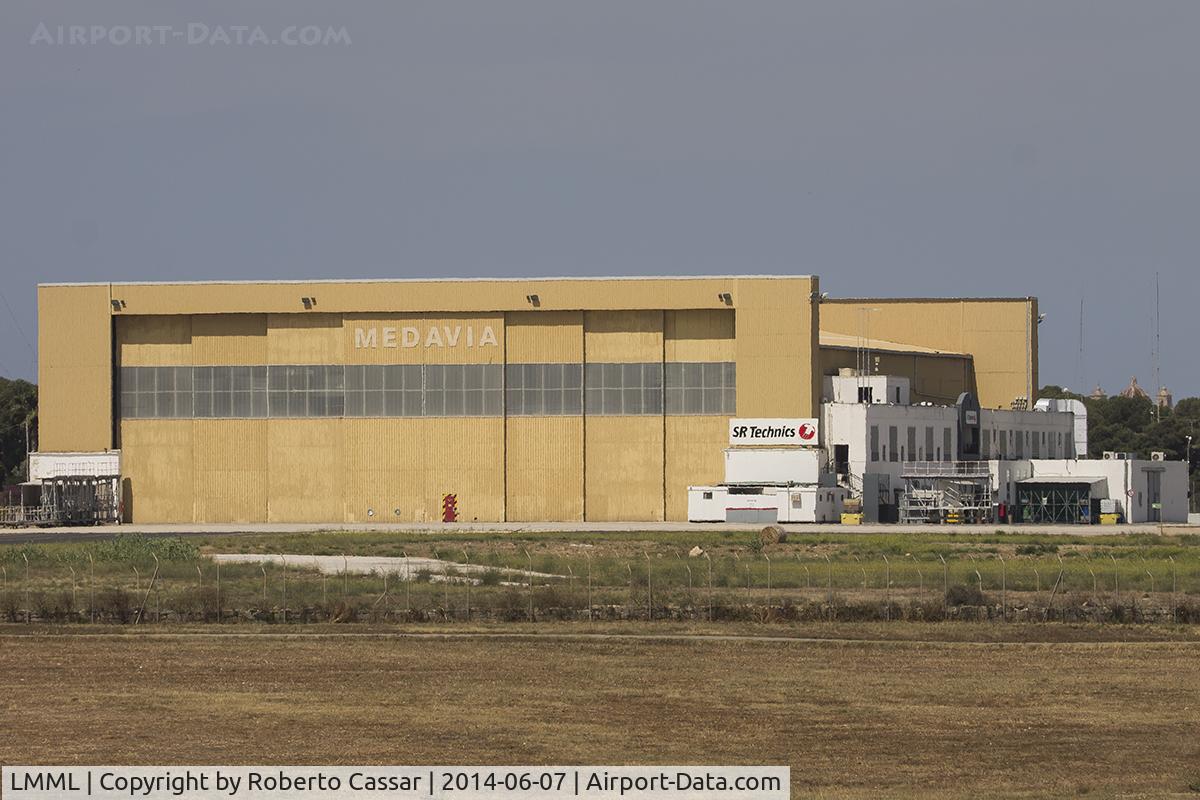 Malta International Airport (Luqa Airport), Luqa Malta (LMML) - The SR Technics hangar at Safi Apron at LMML airport. The hangar is Ex-Medavia now used to service mainly Airbus Narrow body aircraft