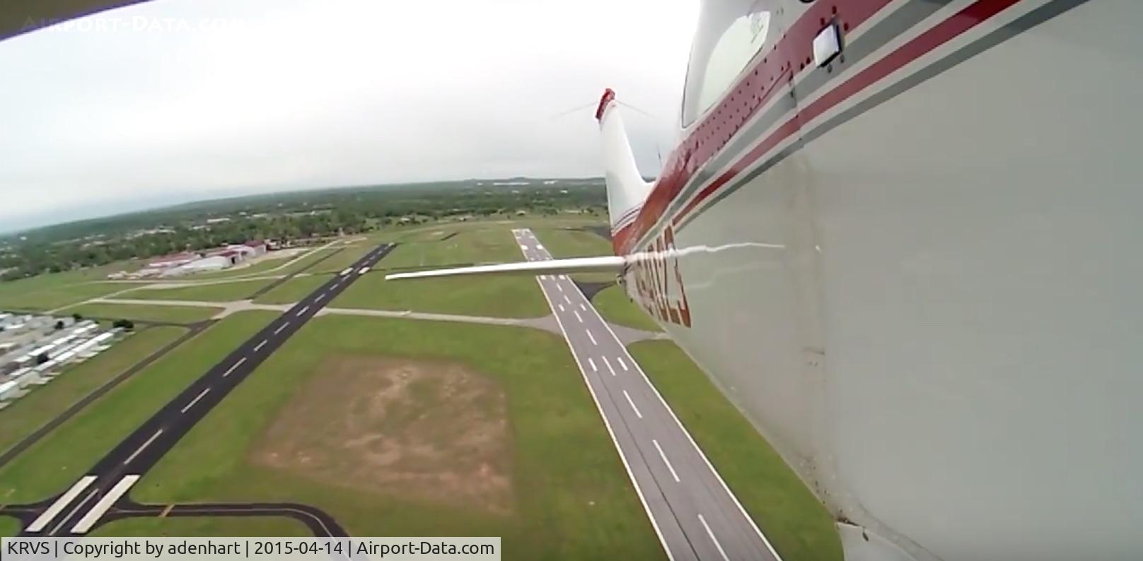 Richard Lloyd Jones Jr Airport (RVS) - N64023 taking off from KRVS