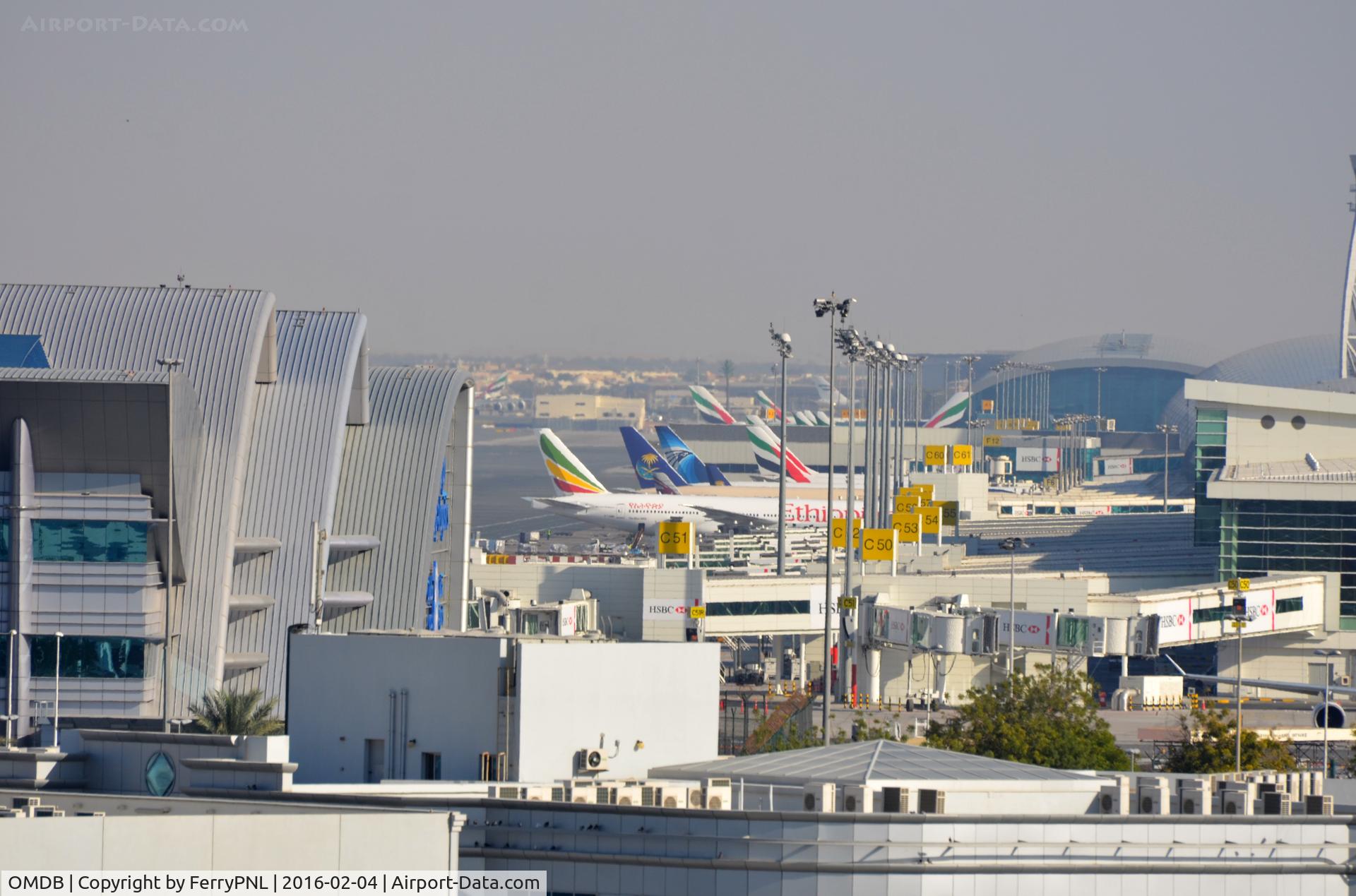 Dubai International Airport, Dubai United Arab Emirates (OMDB) - DXB terminals seen from the west side of the airport.
