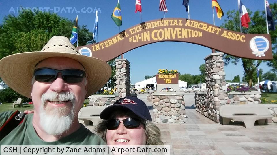 Wittman Regional Airport (OSH) - For my 20,000th photo here on Airport-Data.com, a photo of me and my wonderful wife Dawn at our first trip to the greatness of EAA AirVenture 2015. Wow!