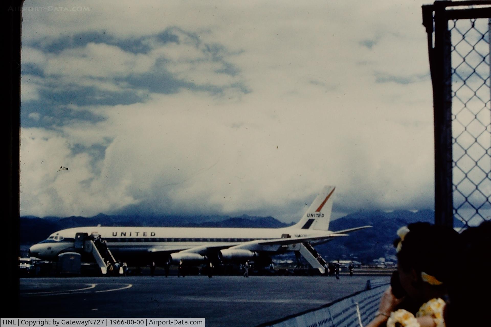 Honolulu International Airport (HNL) - I believe this is N8023U. Photo taken in mid to late 1960s.