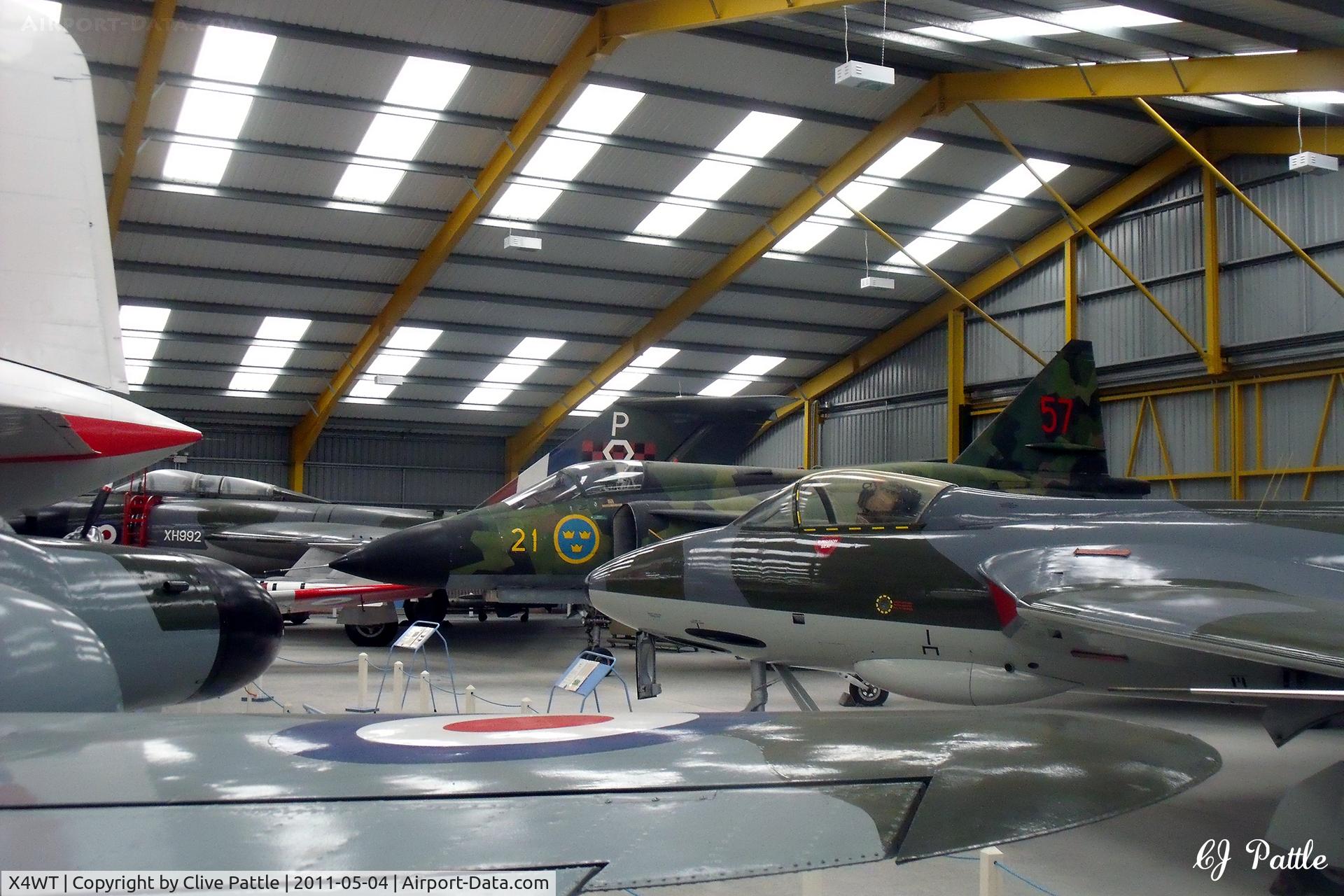 X4WT Airport - Inside one of the display hangars at the Newark Air Museum, Winthorpe, Nottinghamshire. X4WT