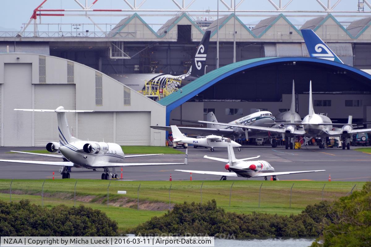 Auckland International Airport, Auckland New Zealand (NZAA) - Great variety in this pic: From DC3 and Convairs, to business jets and B777s...