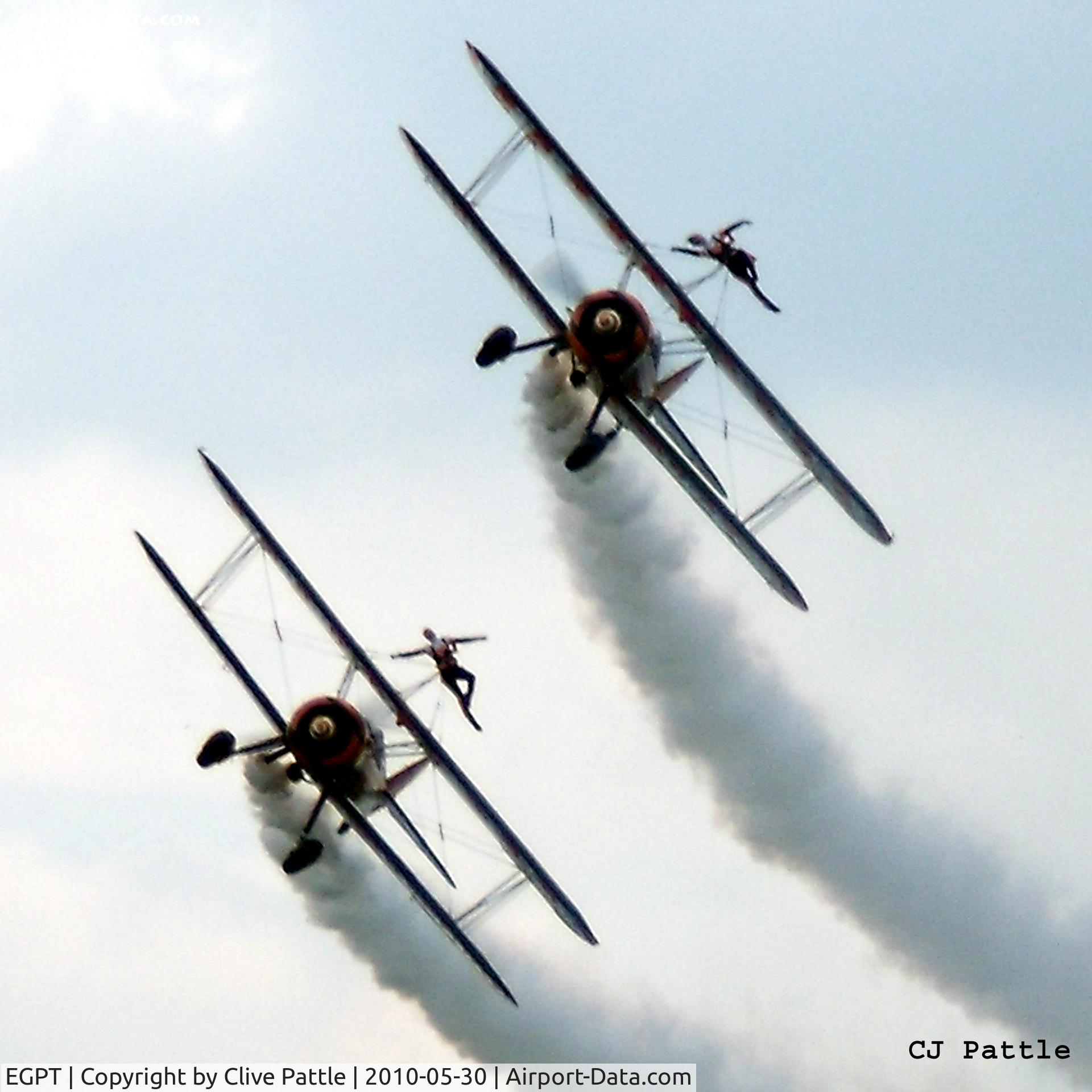 Perth Airport (Scotland), Perth, Scotland United Kingdom (EGPT) - Two (unidentified) Boeing Stearmans of the Breitling Wingwalkers displaying at the Heart of Scotland Airshow at Perth airfield EGPT