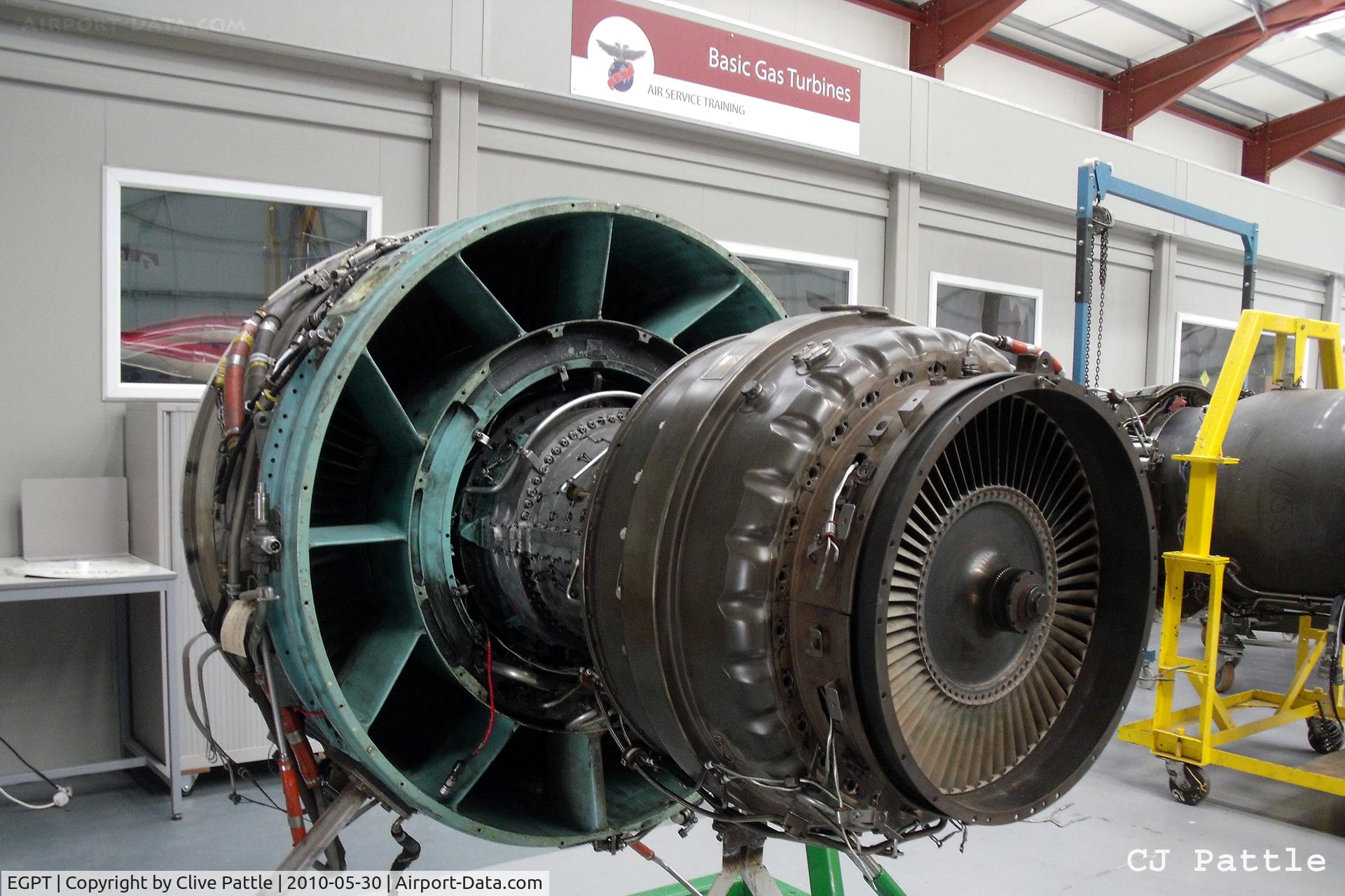 Perth Airport (Scotland), Perth, Scotland United Kingdom (EGPT) - An instructional jet engine on display within the Airwork Service Training (AST) hangar, opened to the public for the Heart of Scotland airshow at Perth EGPT in May 2010