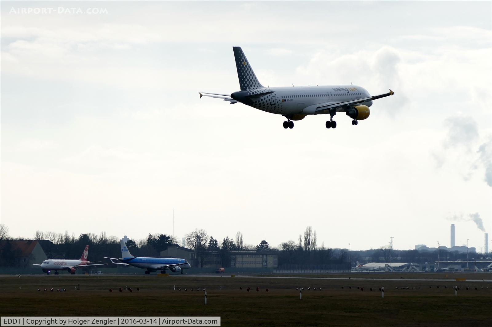 Tegel International Airport (closing in 2011), Berlin Germany (EDDT) - Arrival on rwy 26R meets two depatures on rwy 26L....