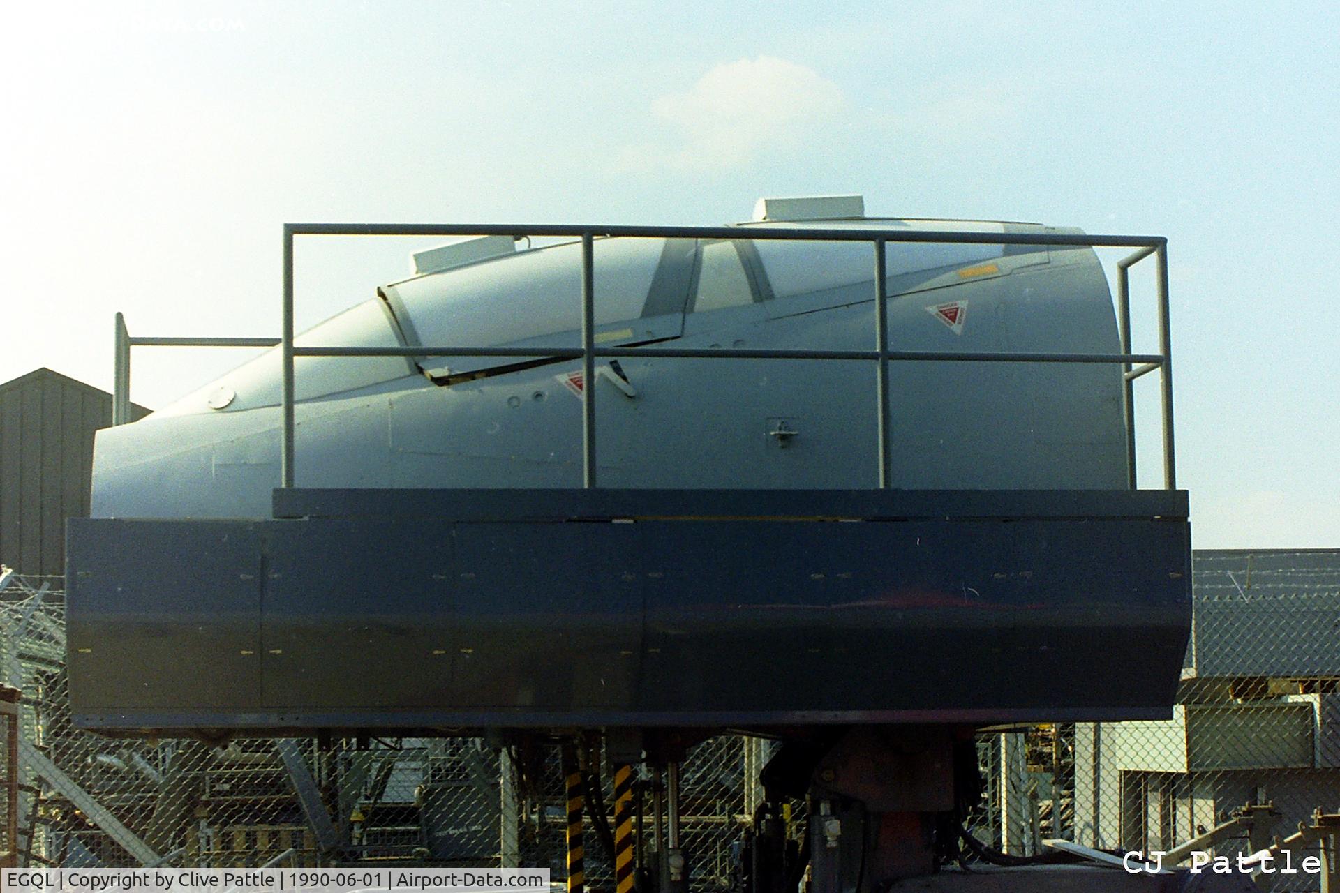RAF Leuchars Airport, Leuchars, Scotland United Kingdom (EGQL) - With Tornado F.3's arriving the Phantom Simulator became redundant. It awaits its fate at RAF Leuchars EGQL in June 1990. Believed to have been preserved.
